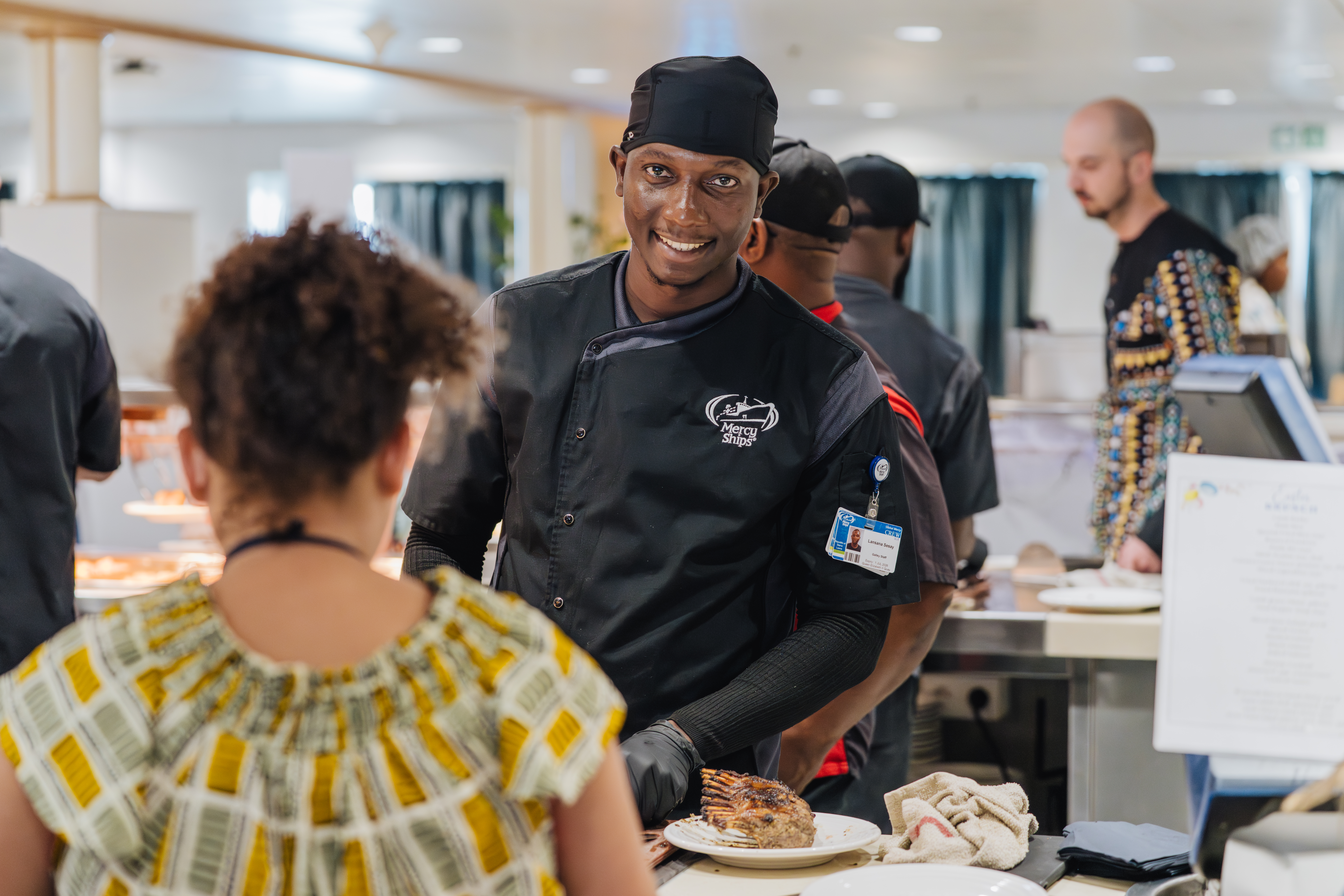 crew members during the easter sunday brunch in the dining room.